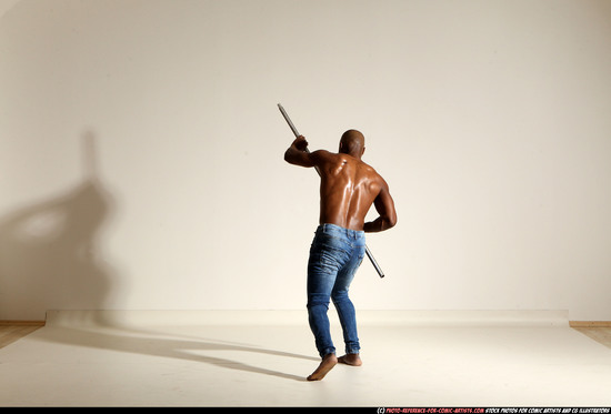 Man Adult Athletic Black Fighting with spear Moving poses Pants