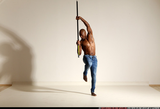 Man Adult Athletic Black Fighting with spear Moving poses Pants