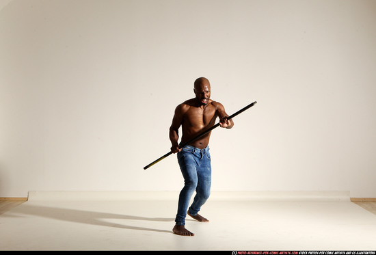 Man Adult Athletic Black Fighting with spear Moving poses Pants