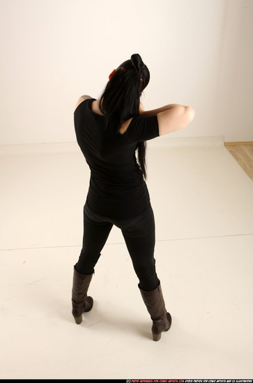 Woman Adult Athletic White Standing poses Casual Fighting with shotgun