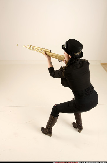 Woman Adult Athletic White Fighting with gun Standing poses Casual