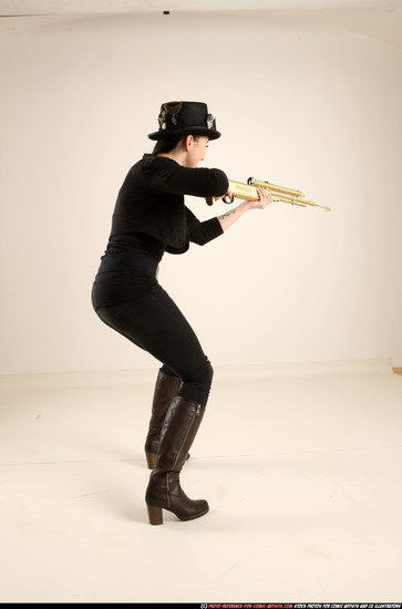 Woman Adult Athletic White Fighting with gun Standing poses Casual