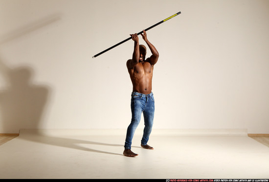 Man Adult Athletic Black Fighting with spear Moving poses Pants