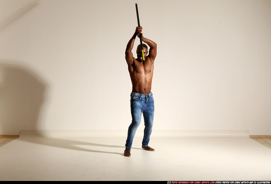 Man Adult Athletic Black Fighting with spear Moving poses Pants