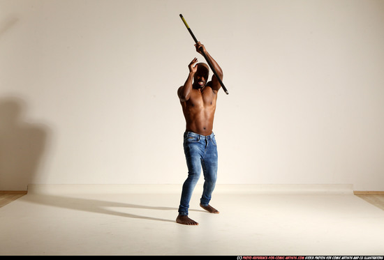 Man Adult Athletic Black Fighting with spear Moving poses Pants