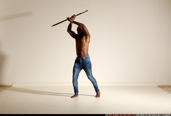 Man Adult Athletic Black Fighting with spear Moving poses Pants