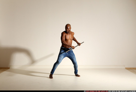 Man Adult Athletic Black Fighting with spear Moving poses Pants