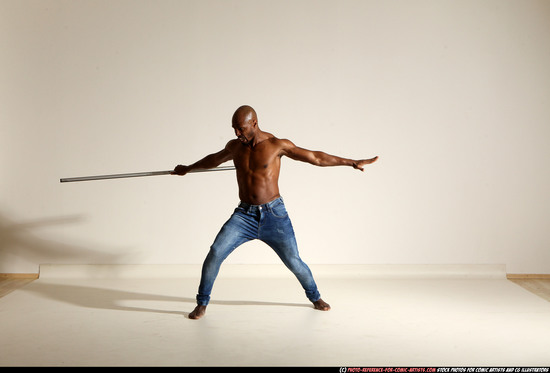 Man Adult Athletic Black Fighting with spear Moving poses Pants