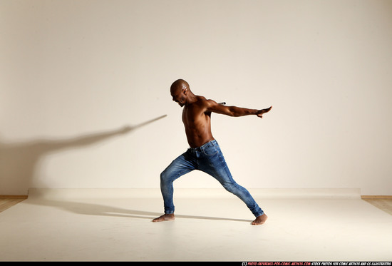 Man Adult Athletic Black Fighting with spear Moving poses Pants