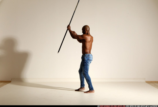 Man Adult Athletic Black Fighting with spear Moving poses Pants