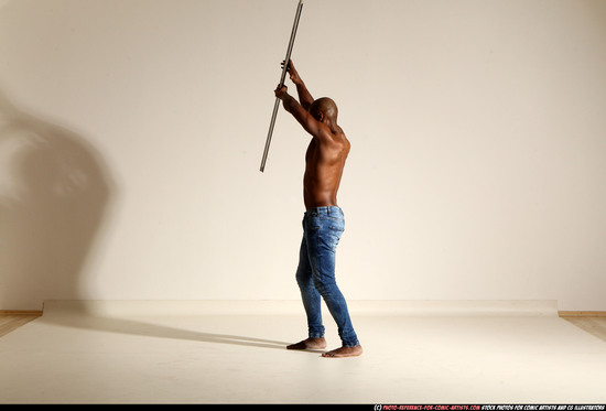 Man Adult Athletic Black Fighting with spear Moving poses Pants