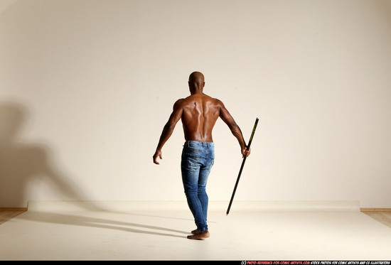 Man Adult Athletic Black Fighting with spear Moving poses Pants