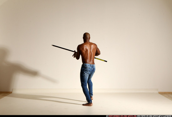 Man Adult Athletic Black Fighting with spear Moving poses Pants