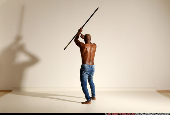 Man Adult Athletic Black Fighting with spear Moving poses Pants