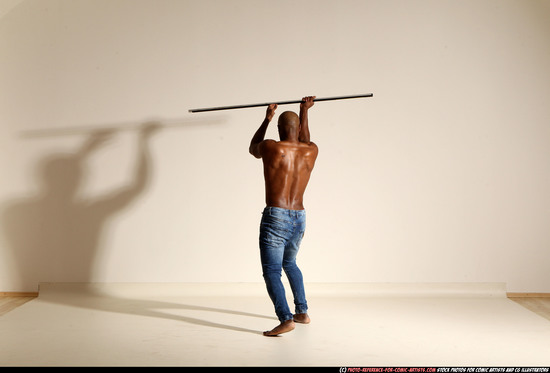 Man Adult Athletic Black Fighting with spear Moving poses Pants