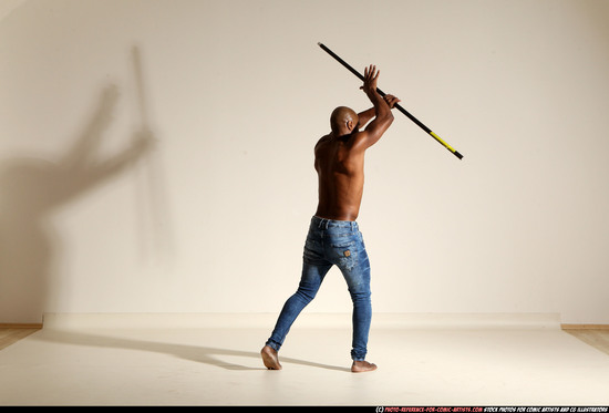 Man Adult Athletic Black Fighting with spear Moving poses Pants