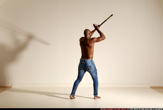 Man Adult Athletic Black Fighting with spear Moving poses Pants