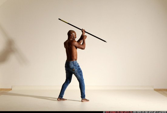 Man Adult Athletic Black Fighting with spear Moving poses Pants