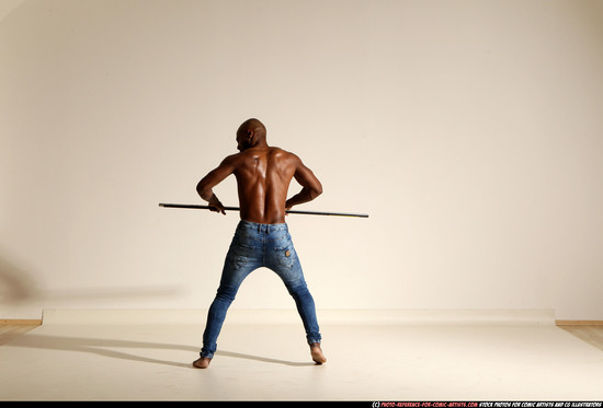 Man Adult Athletic Black Fighting with spear Moving poses Pants