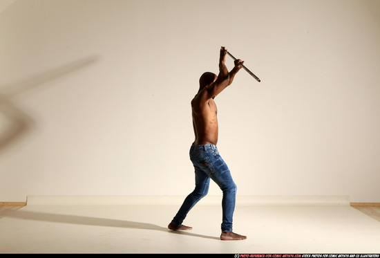 Man Adult Athletic Black Fighting with spear Moving poses Pants