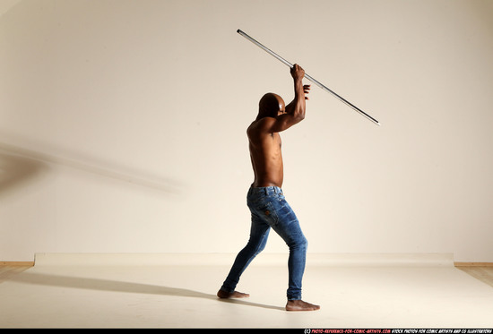 Man Adult Athletic Black Fighting with spear Moving poses Pants