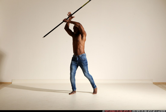 Man Adult Athletic Black Fighting with spear Moving poses Pants