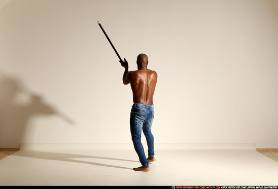 Man Adult Athletic Black Fighting with spear Moving poses Pants