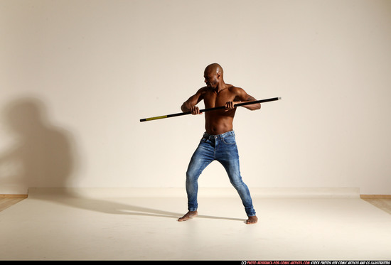 Man Adult Athletic Black Fighting with spear Moving poses Pants