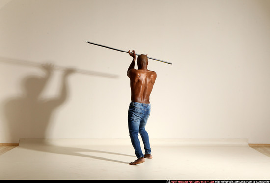 Man Adult Athletic Black Fighting with spear Moving poses Pants