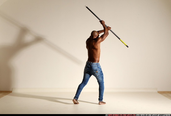 Man Adult Athletic Black Fighting with spear Moving poses Pants