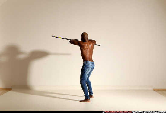 Man Adult Athletic Black Fighting with spear Moving poses Pants