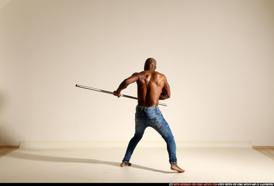 Man Adult Athletic Black Fighting with spear Moving poses Pants