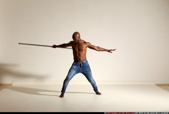 Man Adult Athletic Black Fighting with spear Moving poses Pants