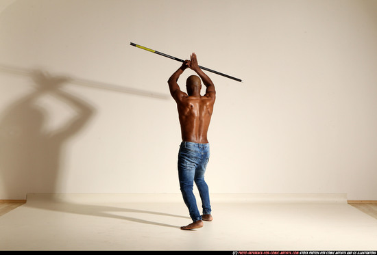 Man Adult Athletic Black Fighting with spear Moving poses Pants