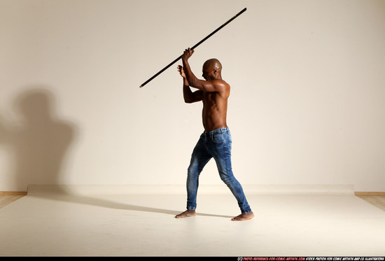 Man Adult Athletic Black Fighting with spear Moving poses Pants