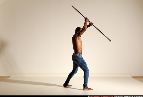 Man Adult Athletic Black Fighting with spear Moving poses Pants