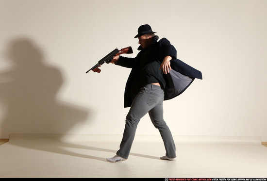 Man Adult Muscular White Fighting with submachine gun Moving poses Coat