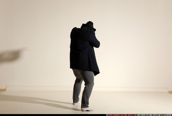 Man Adult Muscular White Fighting with submachine gun Moving poses Coat