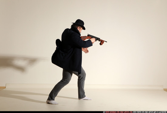 Man Adult Muscular White Fighting with submachine gun Moving poses Coat