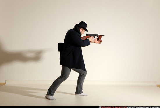 Man Adult Muscular White Fighting with submachine gun Moving poses Coat