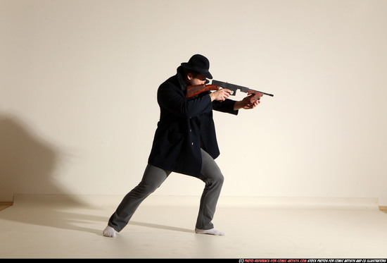 Man Adult Muscular White Fighting with submachine gun Moving poses Coat