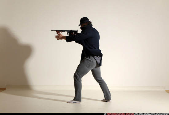 Man Adult Muscular White Fighting with submachine gun Moving poses Coat