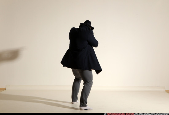 Man Adult Muscular White Fighting with submachine gun Moving poses Coat