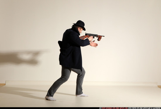 Man Adult Muscular White Fighting with submachine gun Moving poses Coat