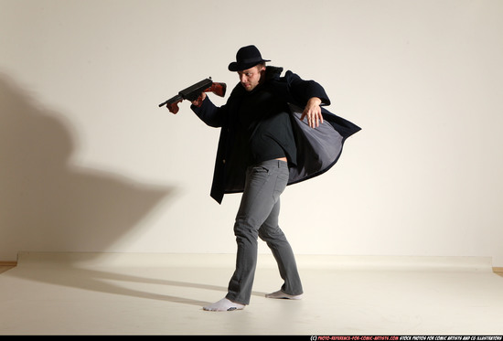 Man Adult Muscular White Fighting with submachine gun Moving poses Coat