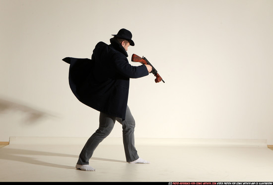 Man Adult Muscular White Fighting with submachine gun Moving poses Coat