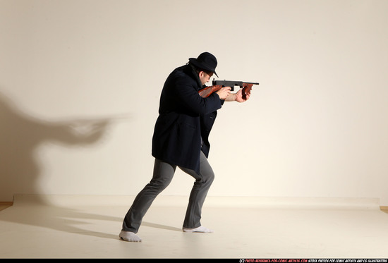 Man Adult Muscular White Fighting with submachine gun Moving poses Coat