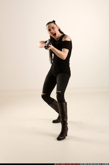 Woman Adult Athletic White Fighting with gun Standing poses Casual