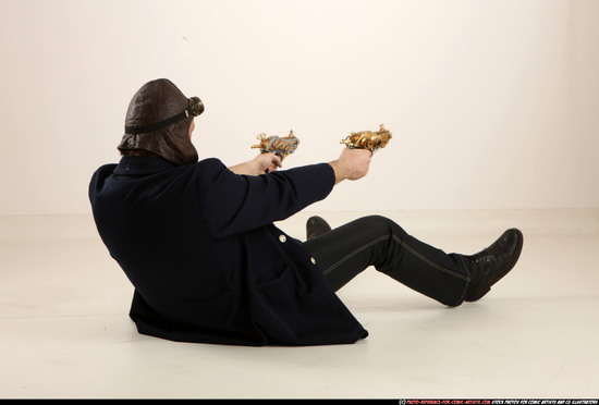 Man Old Average White Fighting with gun Sitting poses Casual