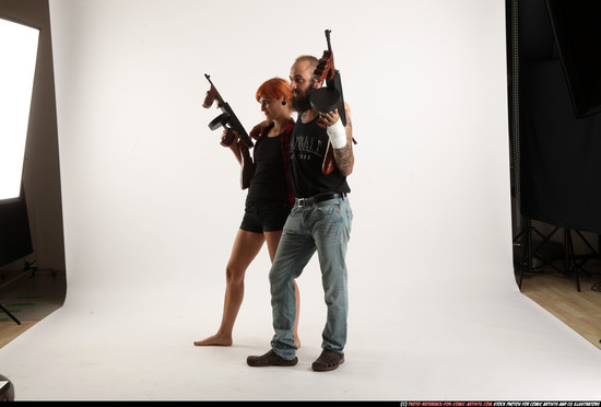 Man & Woman Adult Athletic White Fighting with submachine gun Standing poses Casual